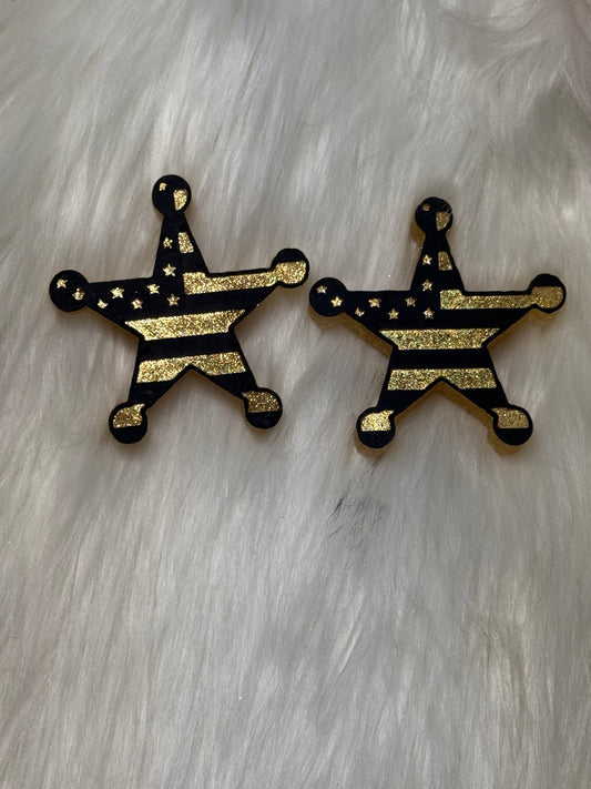 Sheriff/flag badge vent clips