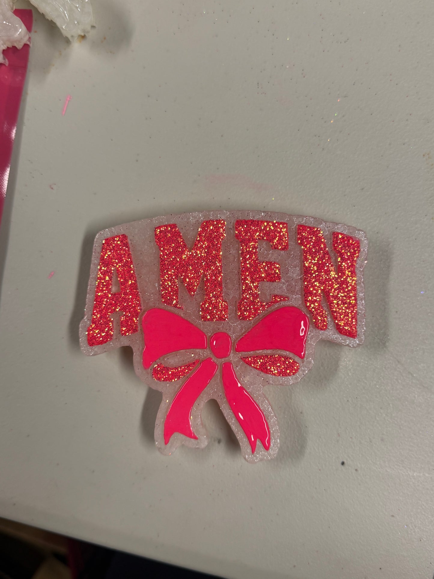 Amen with bow