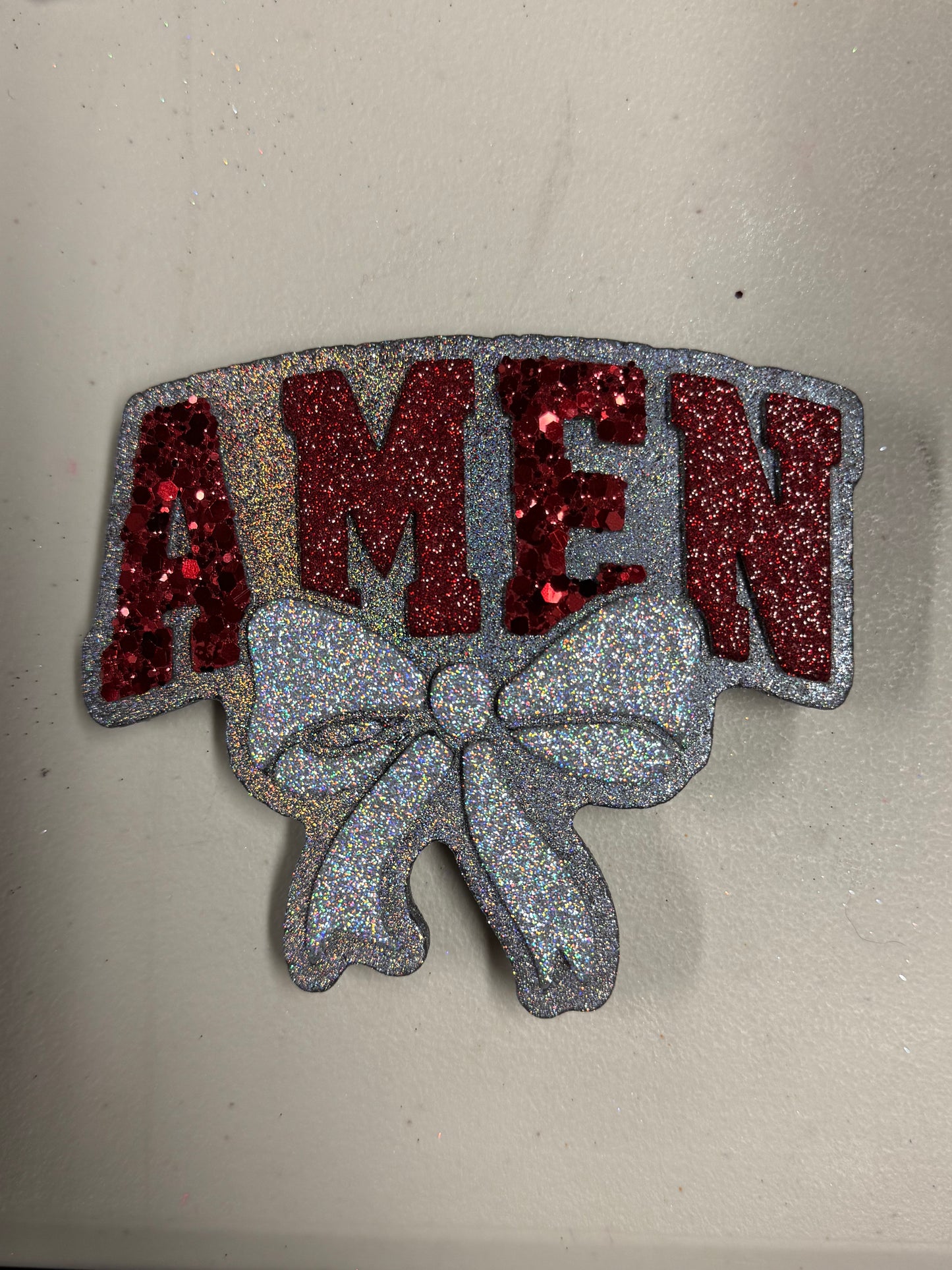Amen with bow